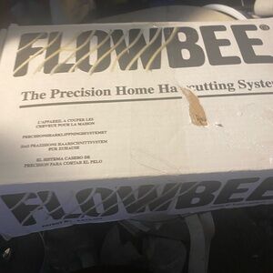 Flowbee hair cutting system